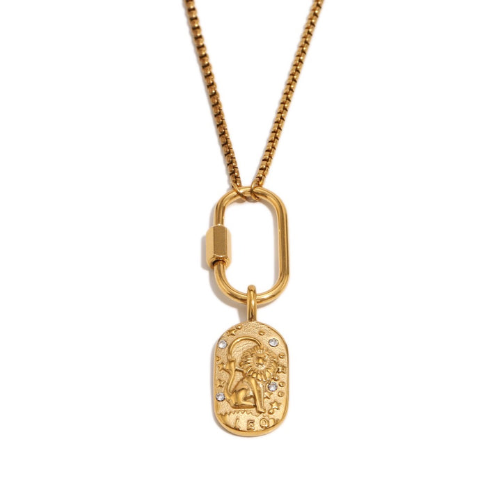 a gold necklace with a pendant