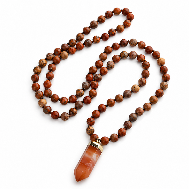a necklace with a stone pendant