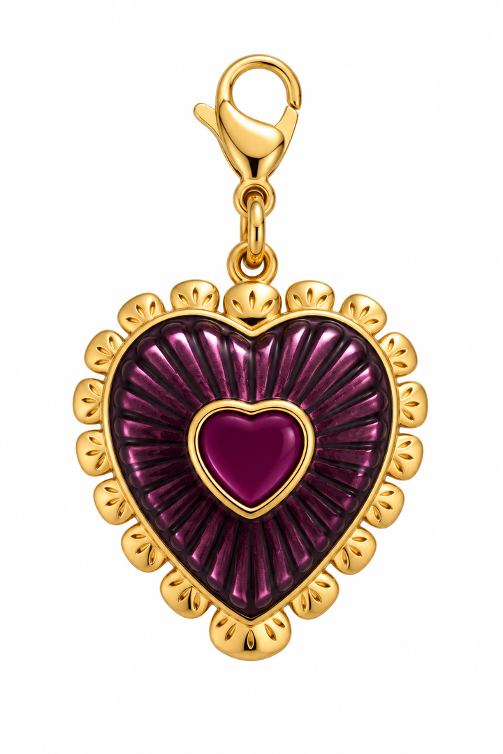 a gold and purple heart pendant