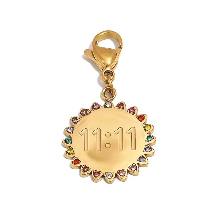 a gold coin with multicolored stones