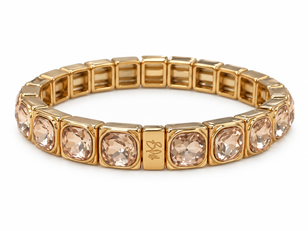 a gold bracelet with diamonds