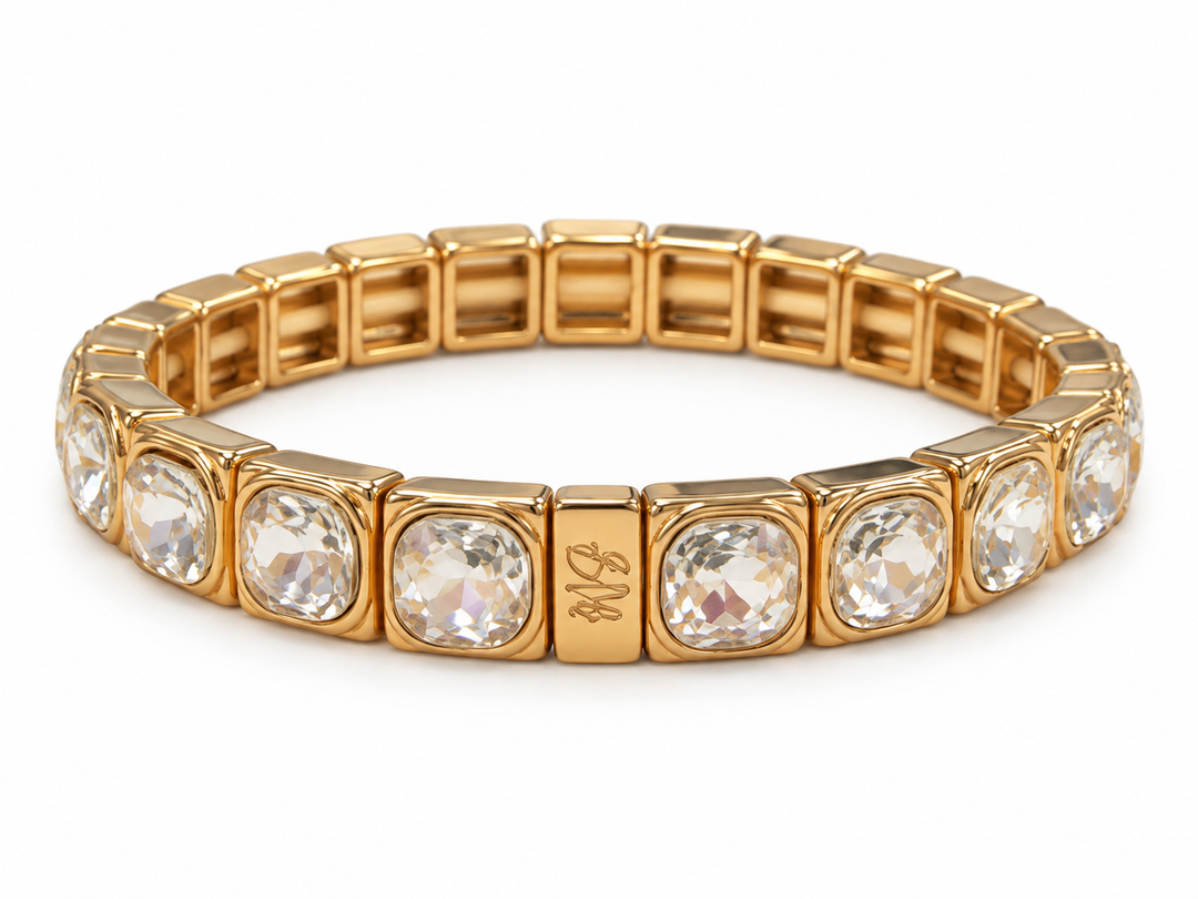 a gold bracelet with diamonds