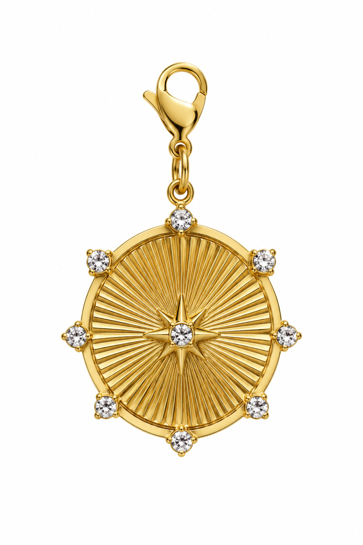 a gold pendant with diamonds