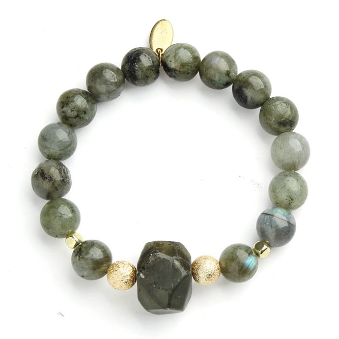 a bracelet with a stone bead