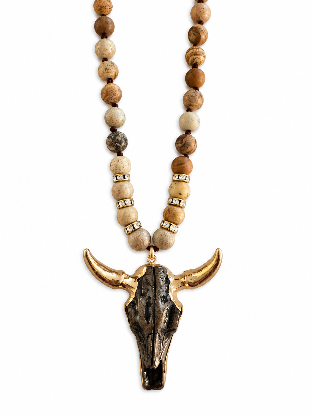 a necklace with a skull pendant and beads