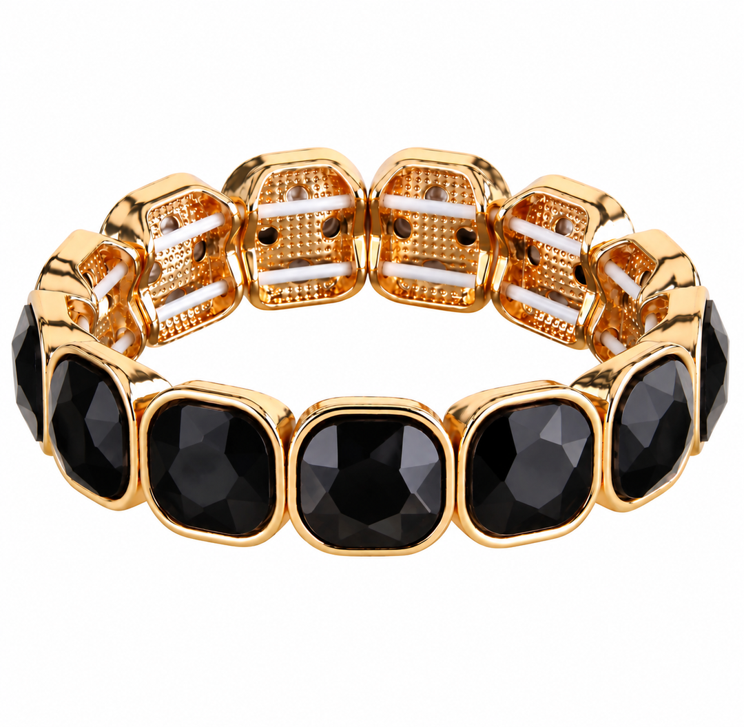 a gold and black bracelet