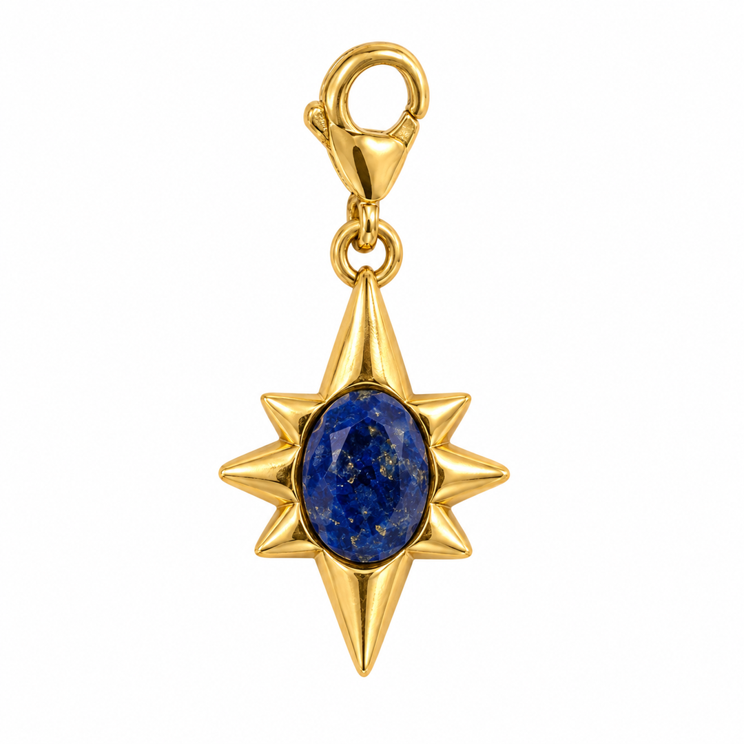 a gold star shaped pendant with blue stone
