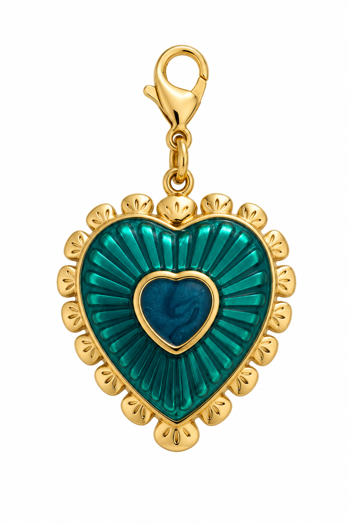 a gold and blue heart pendant