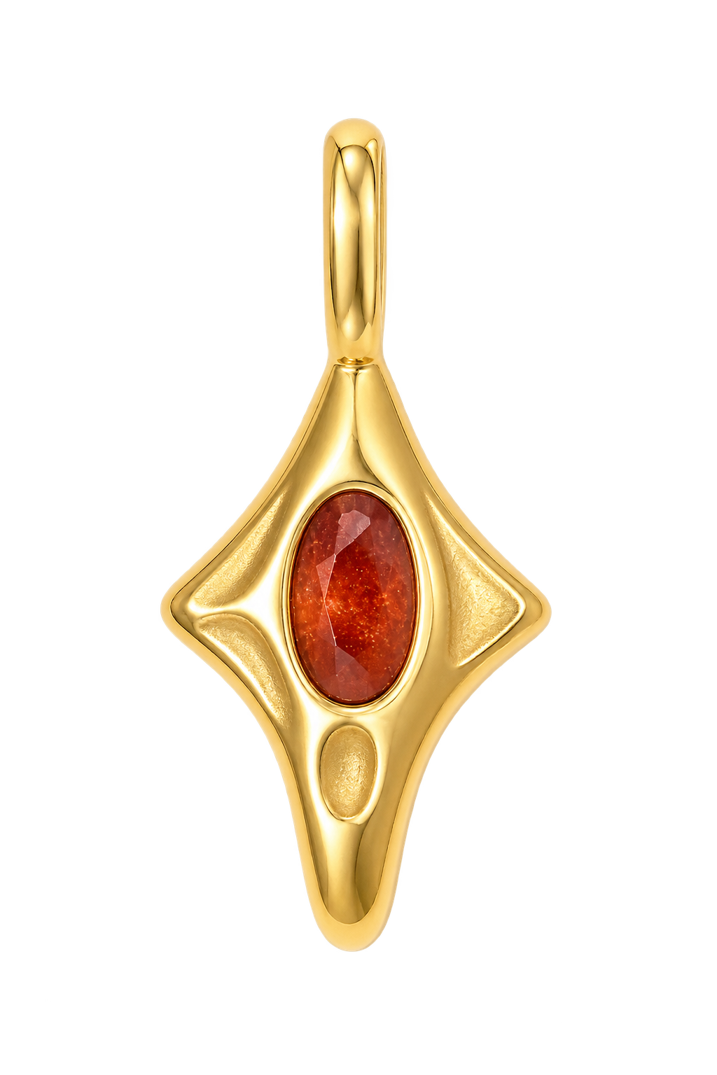a gold pendant with a red stone