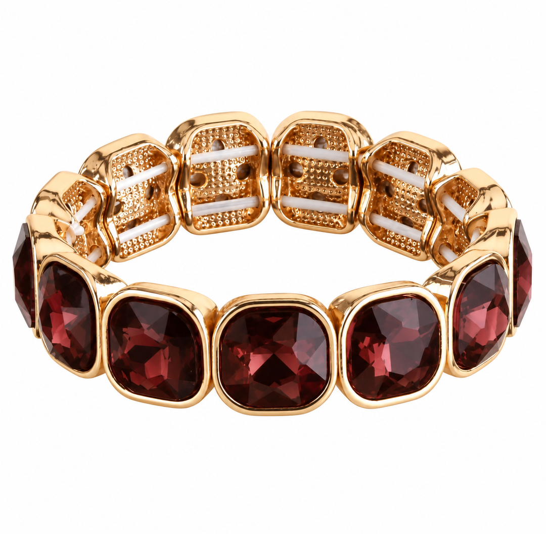 a gold and red bracelet