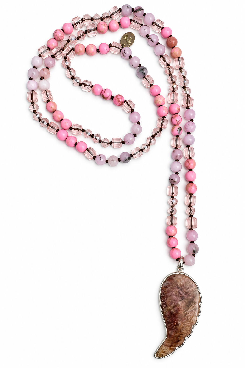 a necklace with a stone pendant