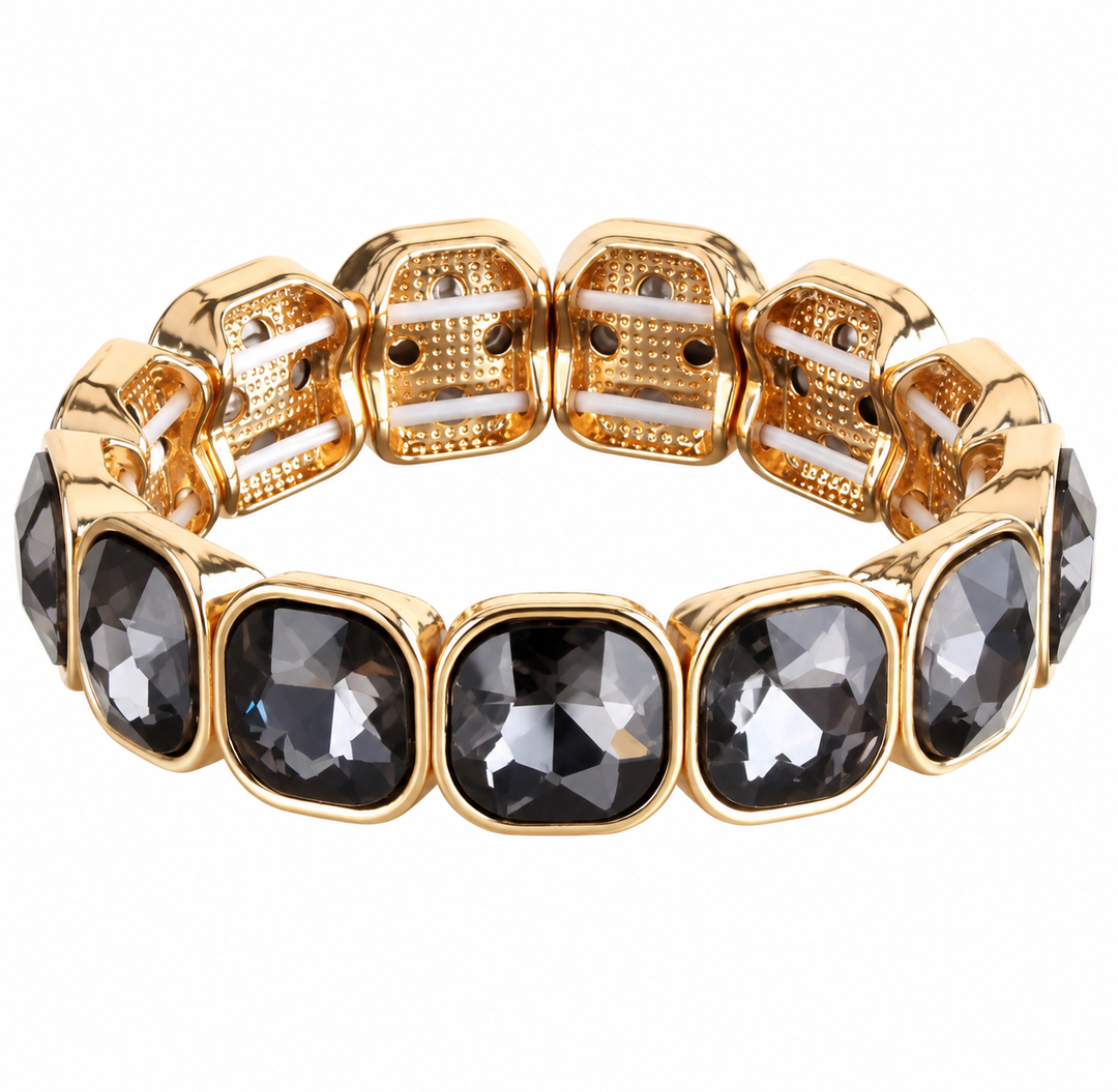 a gold and black bracelet