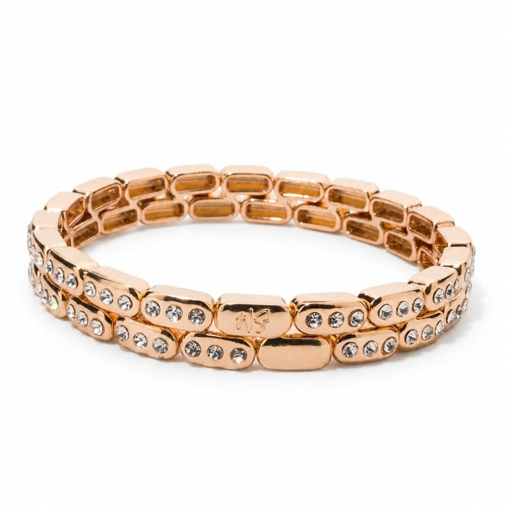 a gold bracelet with diamonds
