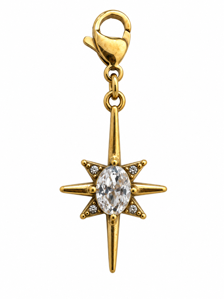 a gold star with a diamond pendant