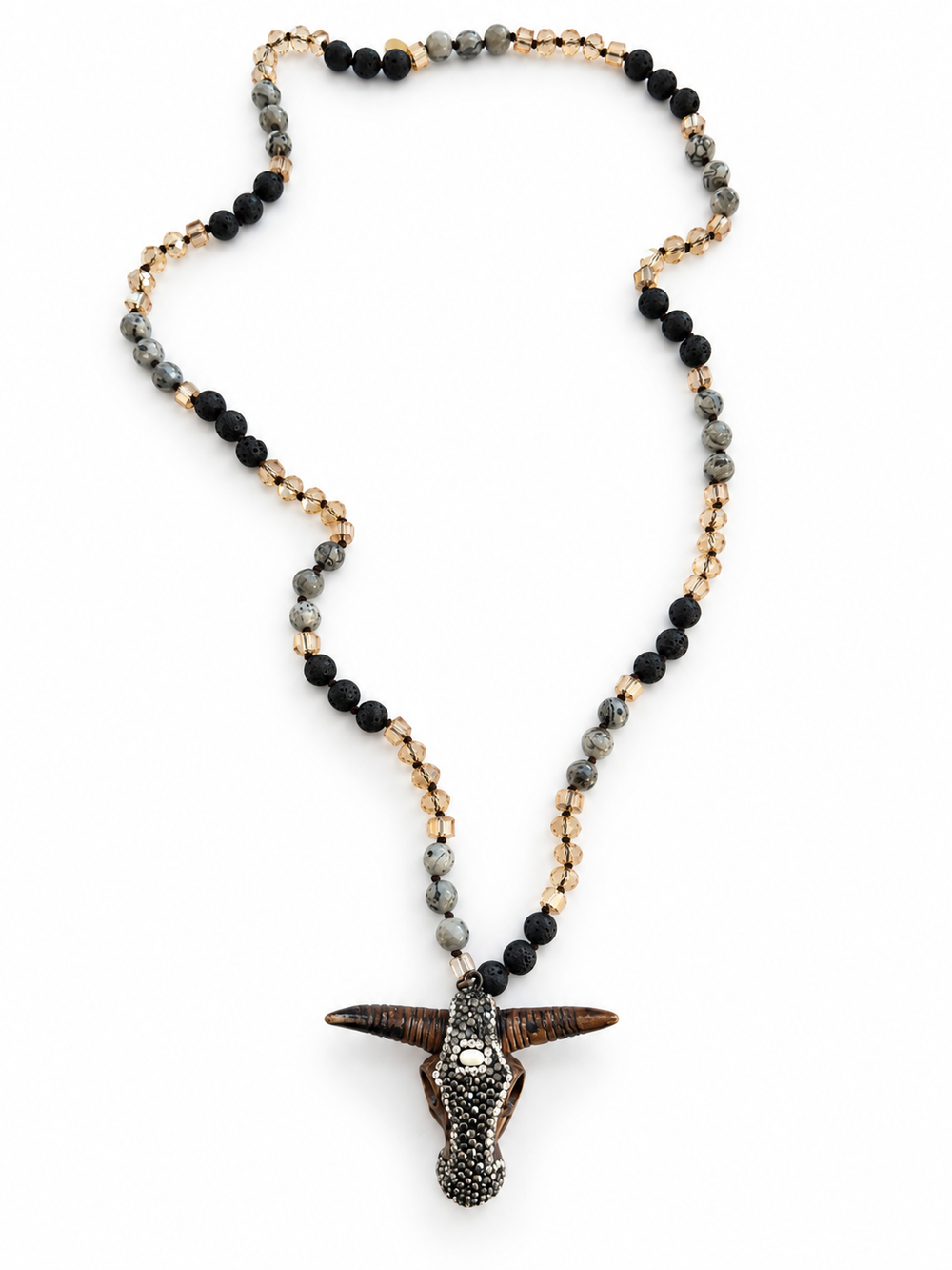 a necklace with a horn pendant