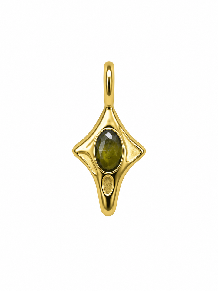 a gold pendant with a green stone
