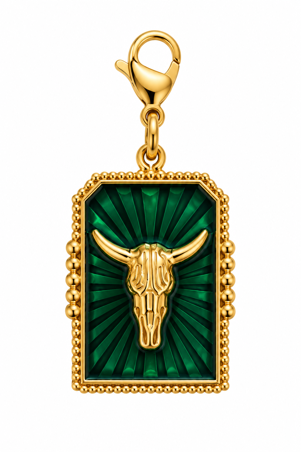 a gold pendant with a bull skull on it