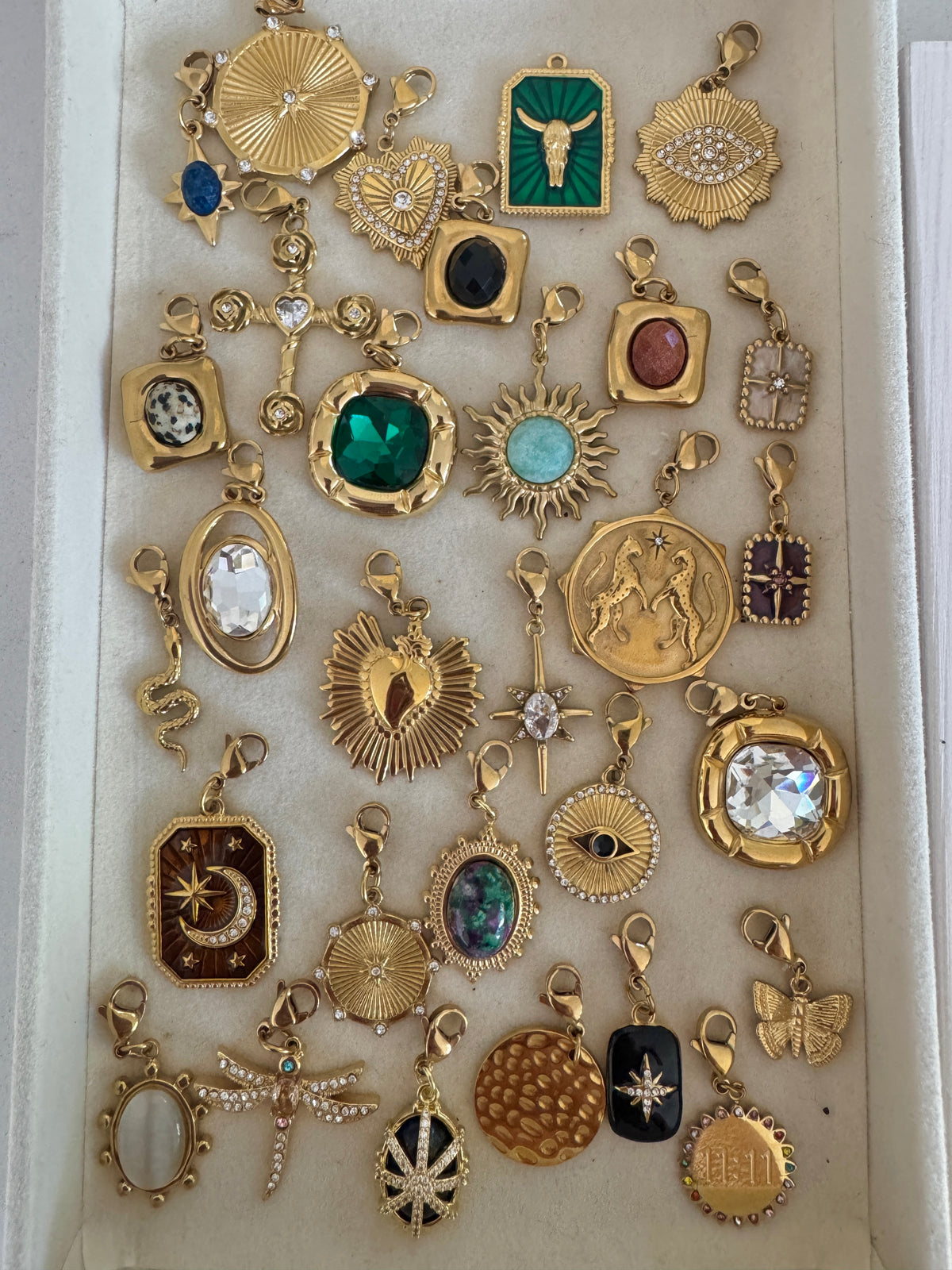 a collection of jewelry in a box