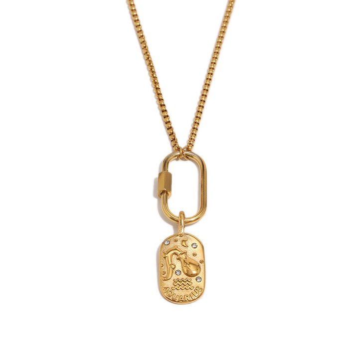 a gold necklace with a pendant
