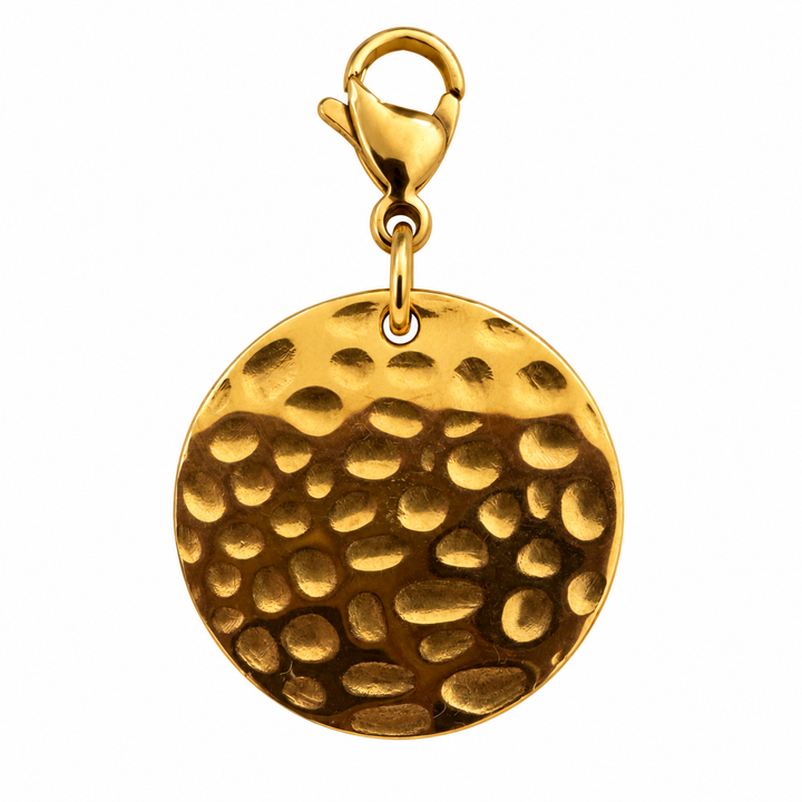 a gold circle with a textured design