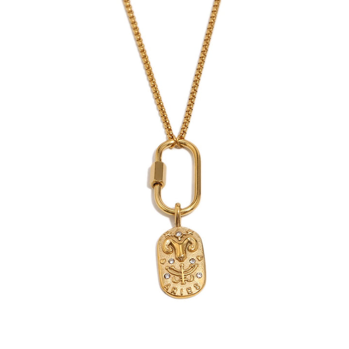 a gold necklace with a gold chain and a pendant