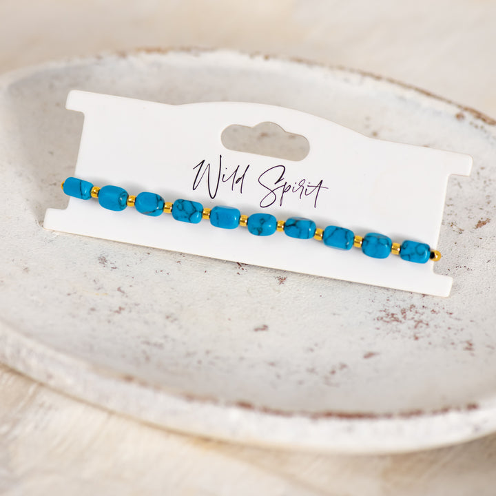 a bracelet on a plate